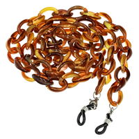 Das Bild zeigt eine braune Brillenkette aus Acryl.